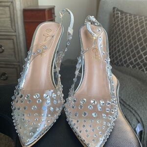 Beautiful crystal 5” high heels. Worn once.